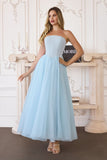 STRAPLESS TULLE BOW BACK GOWN