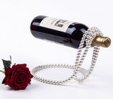 PORTE-CHAMPAGNE FLOTTANT PERLE