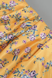 ROBE LONGUE À ÉPAULES UNIQUES ET À VOLANTS À MOTIF FLORAL