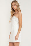 ROBE MINI À BRETELLES FINES ET À FRANGES EN STRASS