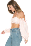 TOP A MANICHE LUNGHE CON SPALLE SCOPERTE