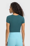 T-SHIRT SPORTIVA A MANICA CORTA CON SCOLLO ROTONDO