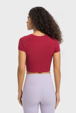 T-SHIRT SPORTIVA A MANICA CORTA CON SCOLLO ROTONDO