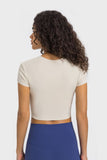 T-SHIRT SPORTIVA A MANICA CORTA CON SCOLLO ROTONDO